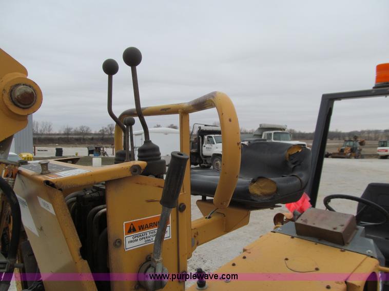 image for item J3347 1999 Case 560 trencher