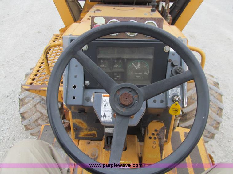 image for item J3347 1999 Case 560 trencher