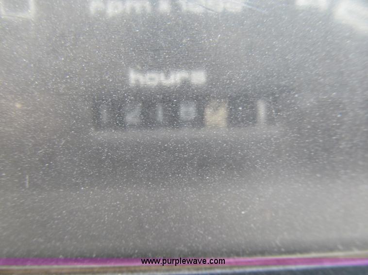 image for item J3347 1999 Case 560 trencher