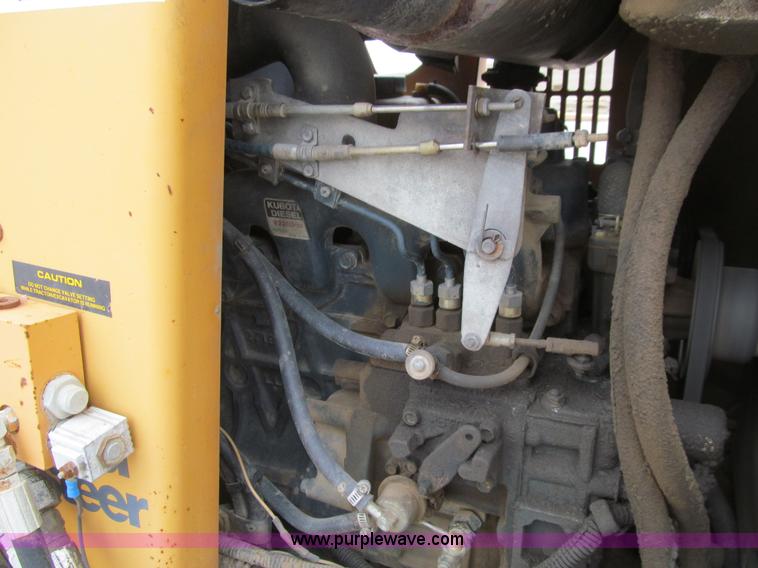 image for item J3347 1999 Case 560 trencher