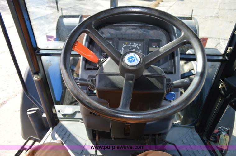 image for item Z9011 New Holland TS110 tractor
