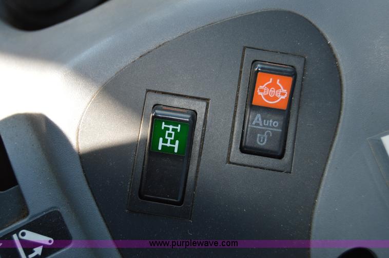 image for item Z9011 New Holland TS110 tractor