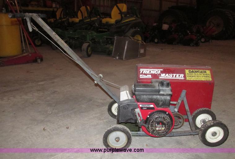 image for item AV9233 Brown F702 Trench Master mini trencher