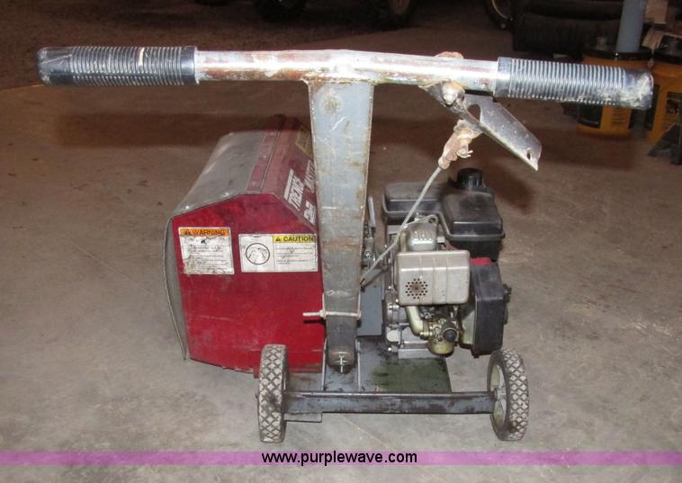 image for item AV9233 Brown F702 Trench Master mini trencher