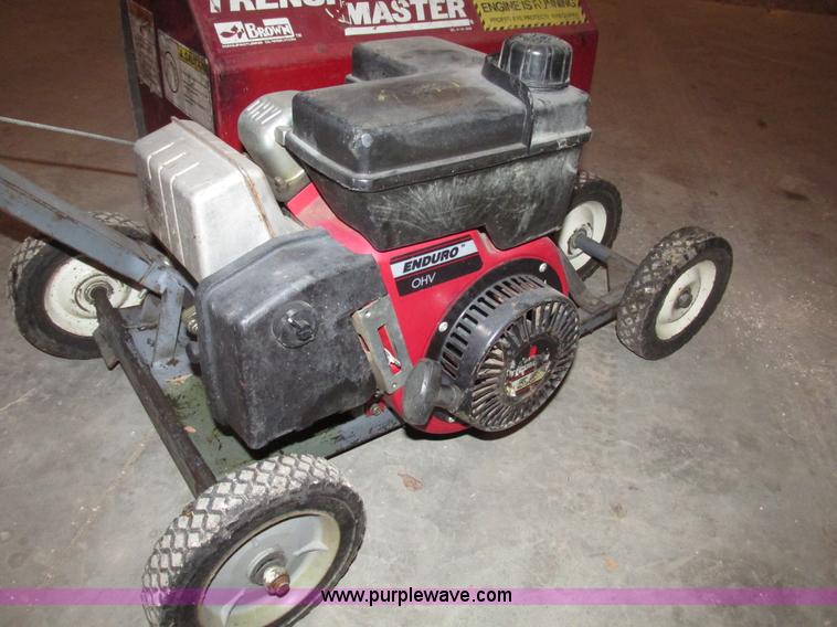 image for item AV9233 Brown F702 Trench Master mini trencher