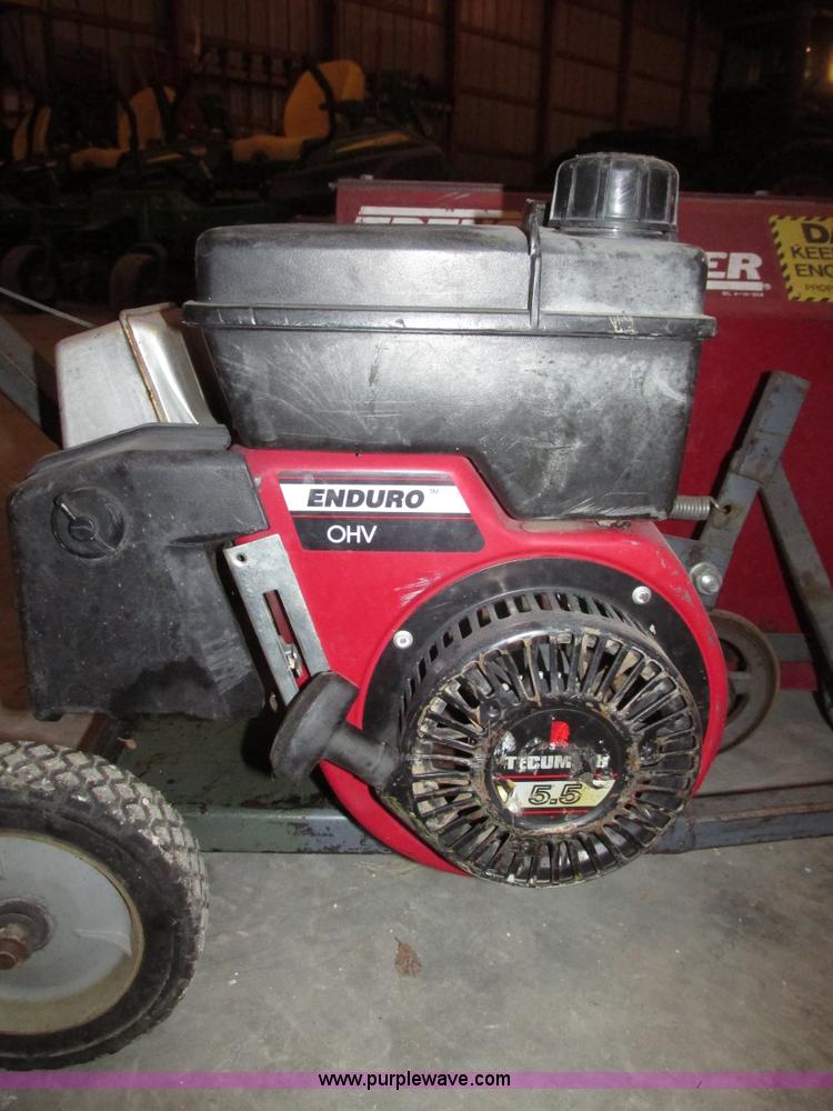 image for item AV9233 Brown F702 Trench Master mini trencher