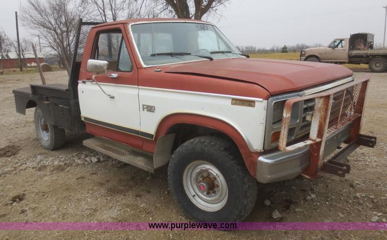 image for item D2234 1984 Ford F250 flatbed pickup truck