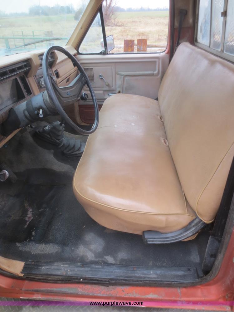 image for item D2234 1984 Ford F250 flatbed pickup truck