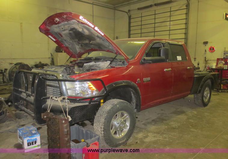 image for item D2240 2010 Dodge Ram 2500 HD Crew Cab flatbed pickup truck