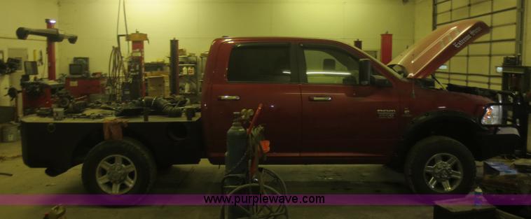 image for item D2240 2010 Dodge Ram 2500 HD Crew Cab flatbed pickup truck