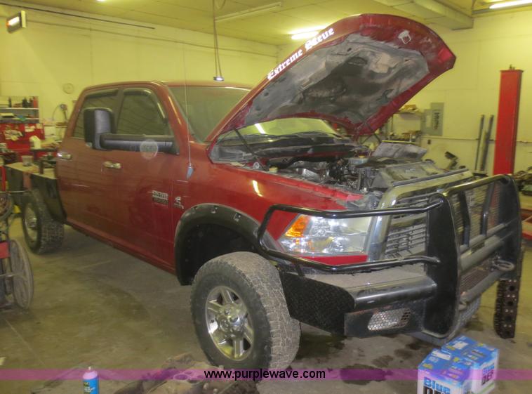 image for item D2240 2010 Dodge Ram 2500 HD Crew Cab flatbed pickup truck