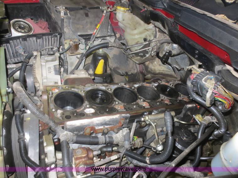 image for item D2240 2010 Dodge Ram 2500 HD Crew Cab flatbed pickup truck