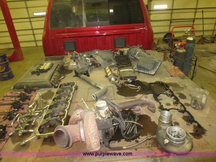 image for item D2240 2010 Dodge Ram 2500 HD Crew Cab flatbed pickup truck