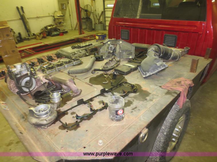 image for item D2240 2010 Dodge Ram 2500 HD Crew Cab flatbed pickup truck