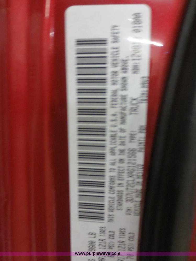 image for item D2240 2010 Dodge Ram 2500 HD Crew Cab flatbed pickup truck