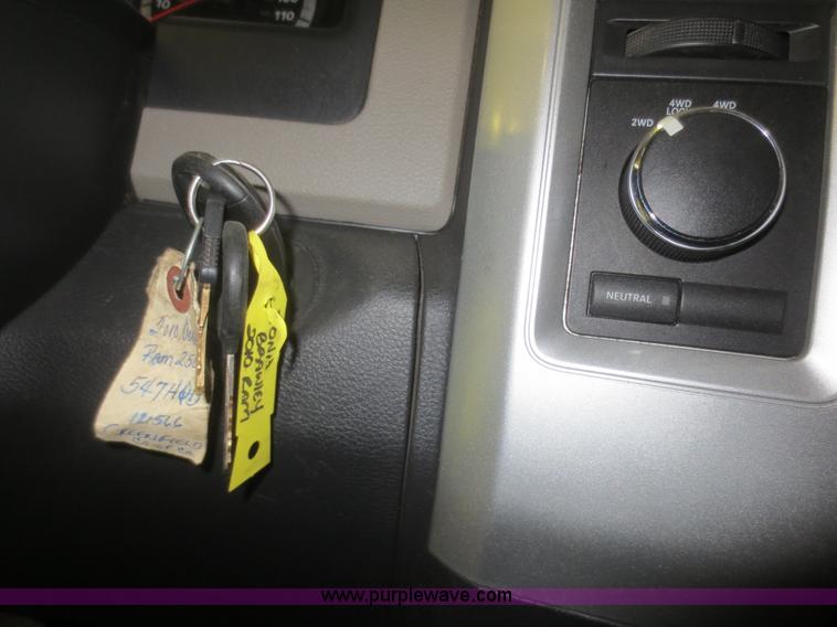 image for item D2240 2010 Dodge Ram 2500 HD Crew Cab flatbed pickup truck