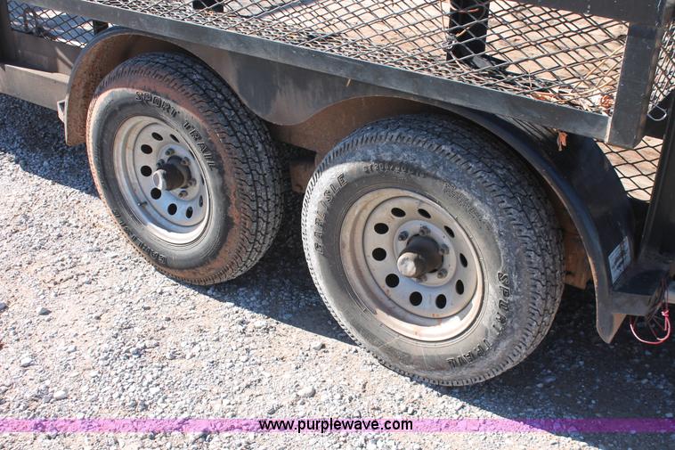 image for item H5516 2010 Horsecreek tandem axle flatbed utility trailer