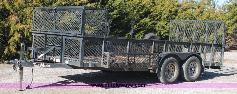 image for item H5517 2010 Trailmaster tandem axle flatbed utility trailer