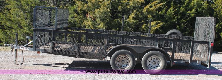 image for item H5517 2010 Trailmaster tandem axle flatbed utility trailer