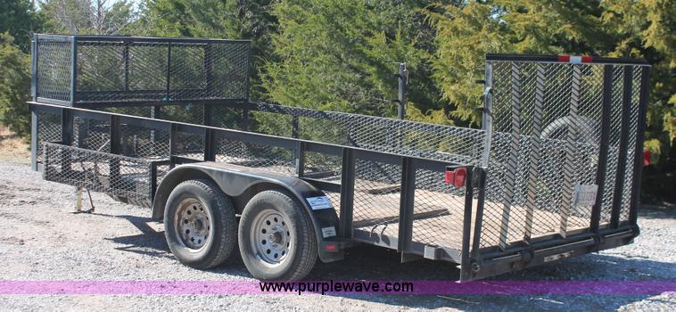image for item H5517 2010 Trailmaster tandem axle flatbed utility trailer