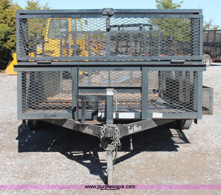 image for item H5517 2010 Trailmaster tandem axle flatbed utility trailer
