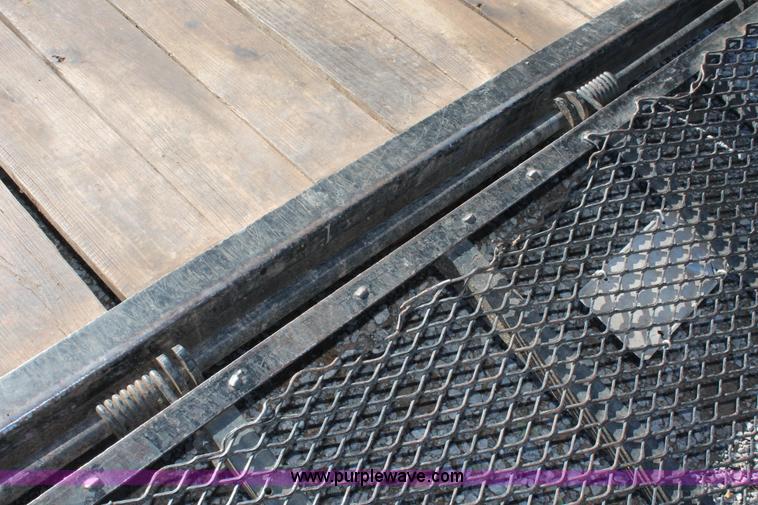 image for item H5517 2010 Trailmaster tandem axle flatbed utility trailer