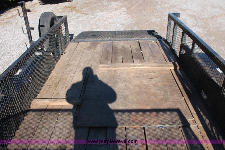 image for item H5517 2010 Trailmaster tandem axle flatbed utility trailer
