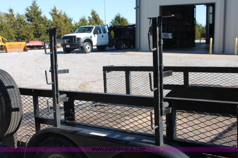 image for item H5517 2010 Trailmaster tandem axle flatbed utility trailer