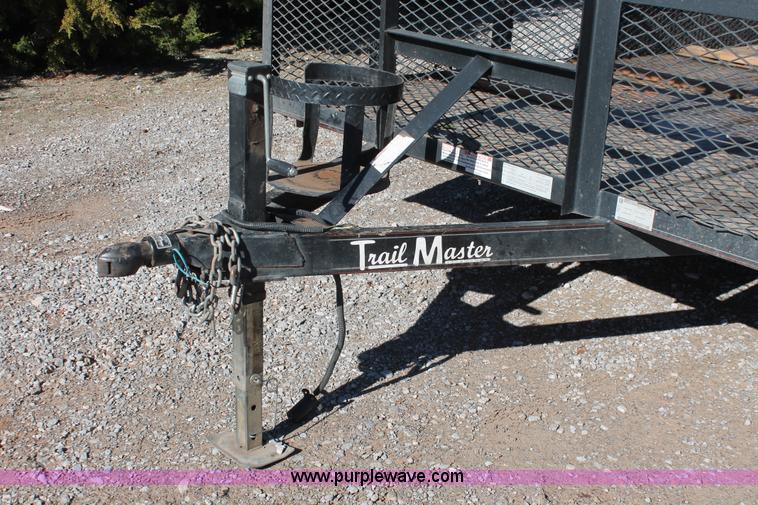 image for item H5517 2010 Trailmaster tandem axle flatbed utility trailer