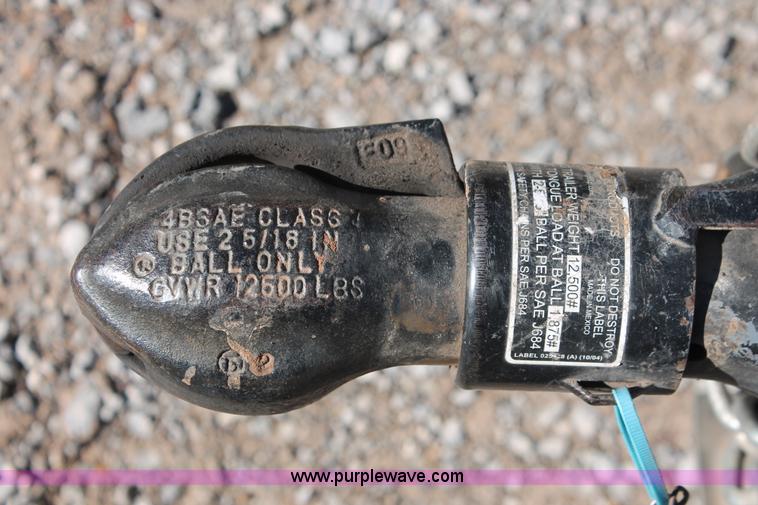 image for item H5517 2010 Trailmaster tandem axle flatbed utility trailer