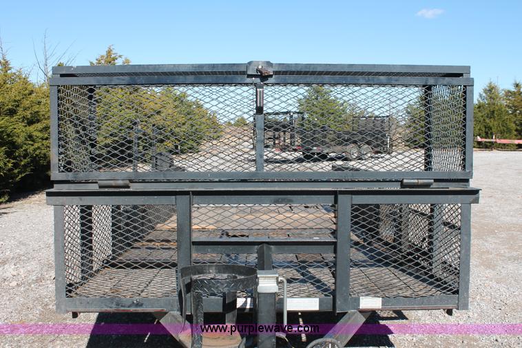 image for item H5517 2010 Trailmaster tandem axle flatbed utility trailer