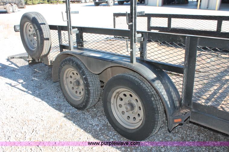 image for item H5517 2010 Trailmaster tandem axle flatbed utility trailer