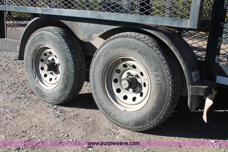 image for item H5525 2010 Horsecreek tandem axle flatbed utility trailer