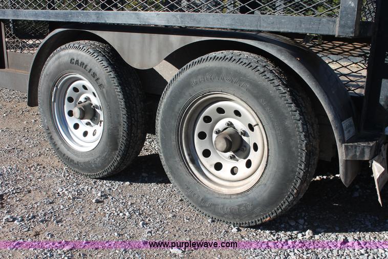 image for item H5526 2010 Horsecreek tandem axle flatbed utility trailer
