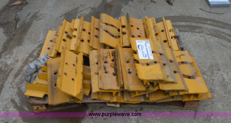 image for item I6944 Approximately 37 Caterpillar D4HXL track pads