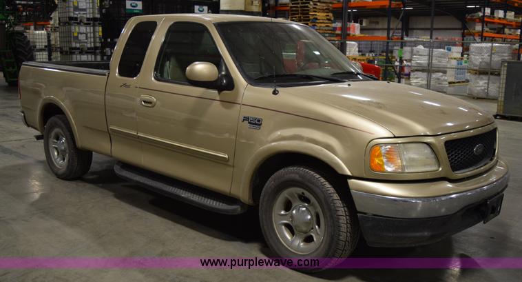 image for item I8585 2000 Ford F150 Lariat SuperCab pickup truck
