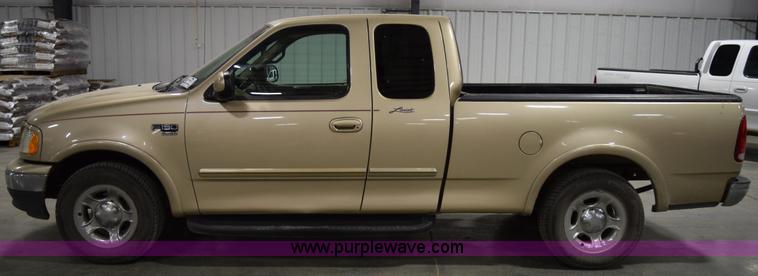 image for item I8585 2000 Ford F150 Lariat SuperCab pickup truck