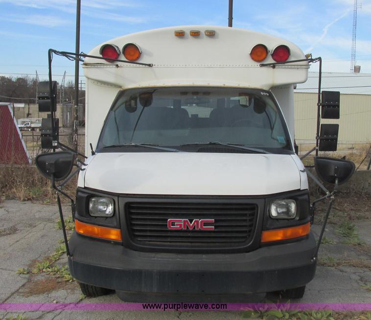 image for item J2353 2004 GMC Savana Thomas Built bus