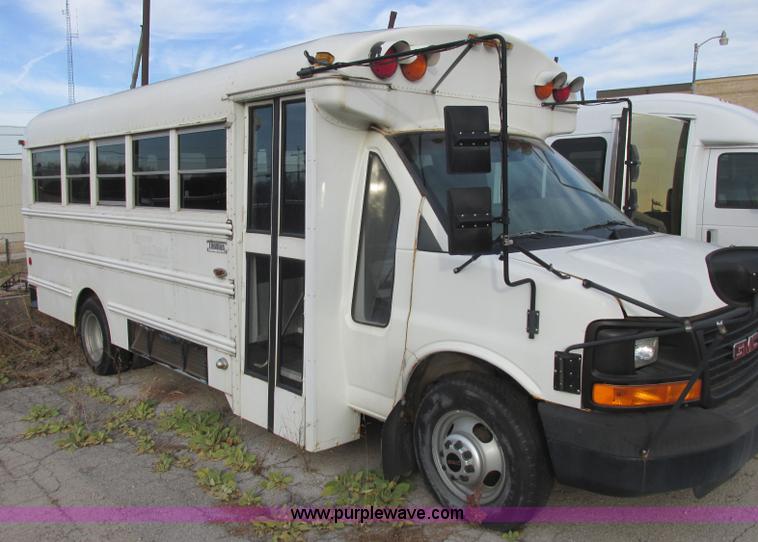 image for item J2353 2004 GMC Savana Thomas Built bus