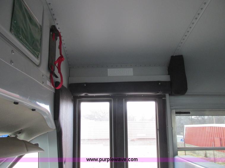 image for item J2353 2004 GMC Savana Thomas Built bus