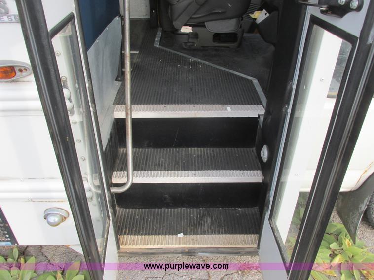 image for item J2353 2004 GMC Savana Thomas Built bus