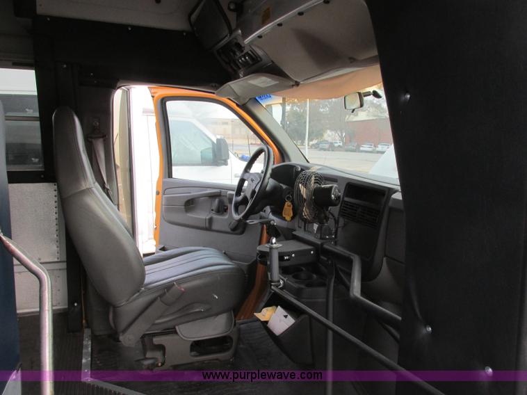 image for item J2353 2004 GMC Savana Thomas Built bus