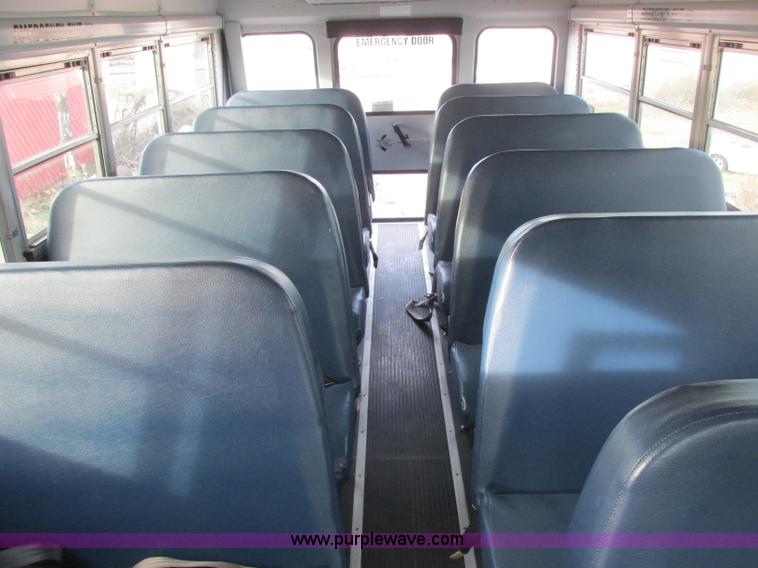 image for item J2353 2004 GMC Savana Thomas Built bus