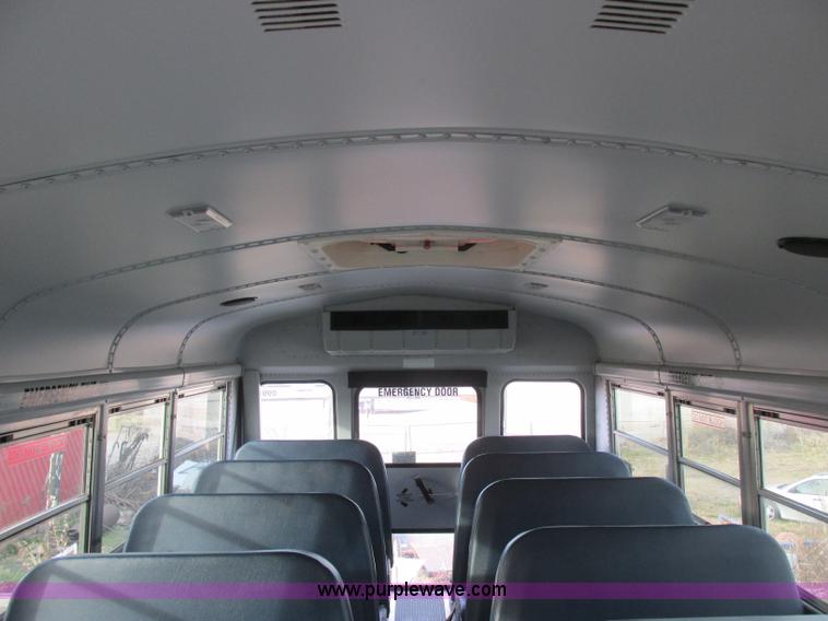 image for item J2353 2004 GMC Savana Thomas Built bus