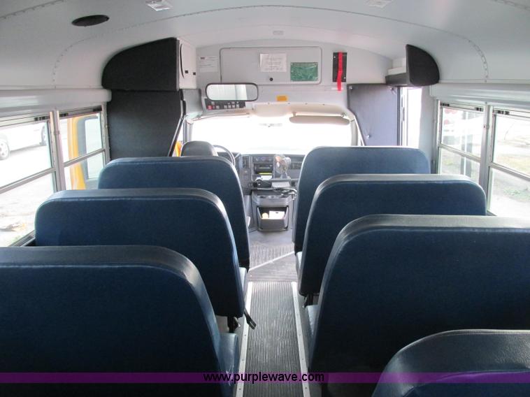 image for item J2353 2004 GMC Savana Thomas Built bus