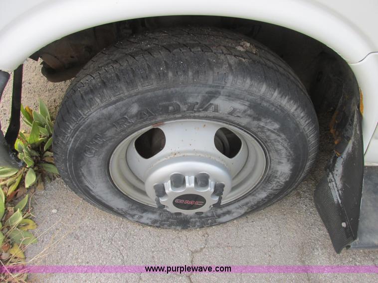 image for item J2353 2004 GMC Savana Thomas Built bus