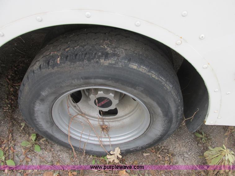 image for item J2353 2004 GMC Savana Thomas Built bus