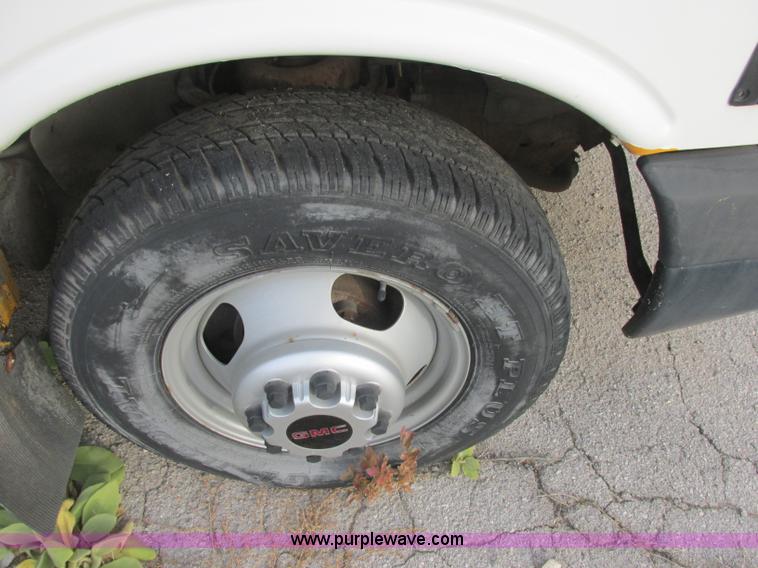 image for item J2353 2004 GMC Savana Thomas Built bus