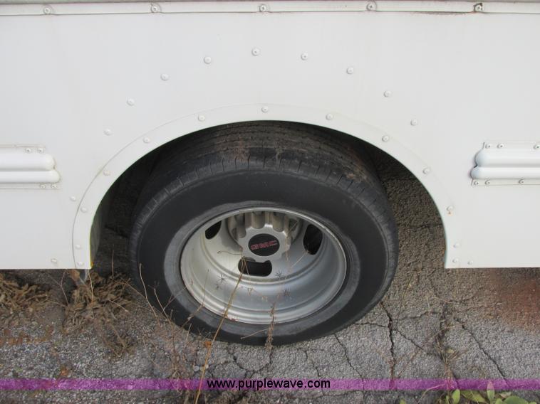 image for item J2353 2004 GMC Savana Thomas Built bus