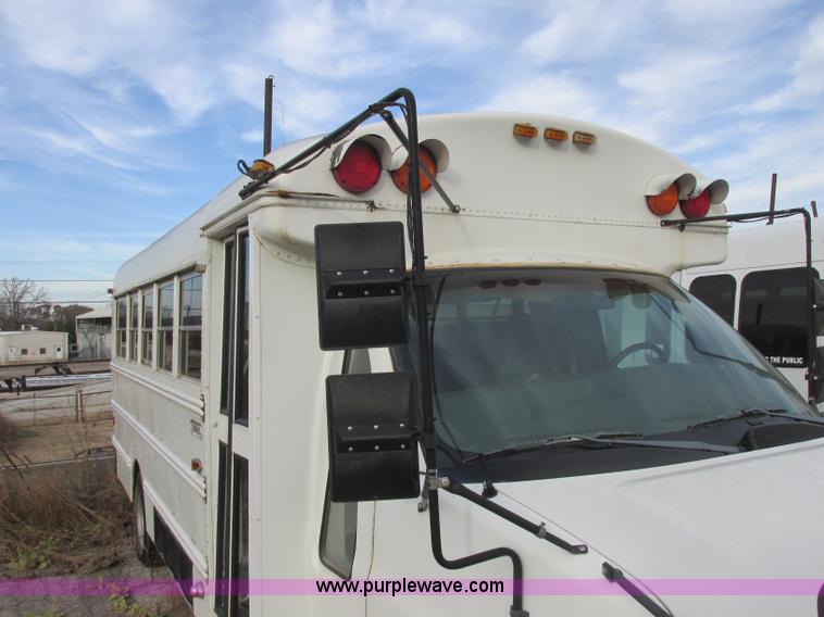 image for item J2353 2004 GMC Savana Thomas Built bus